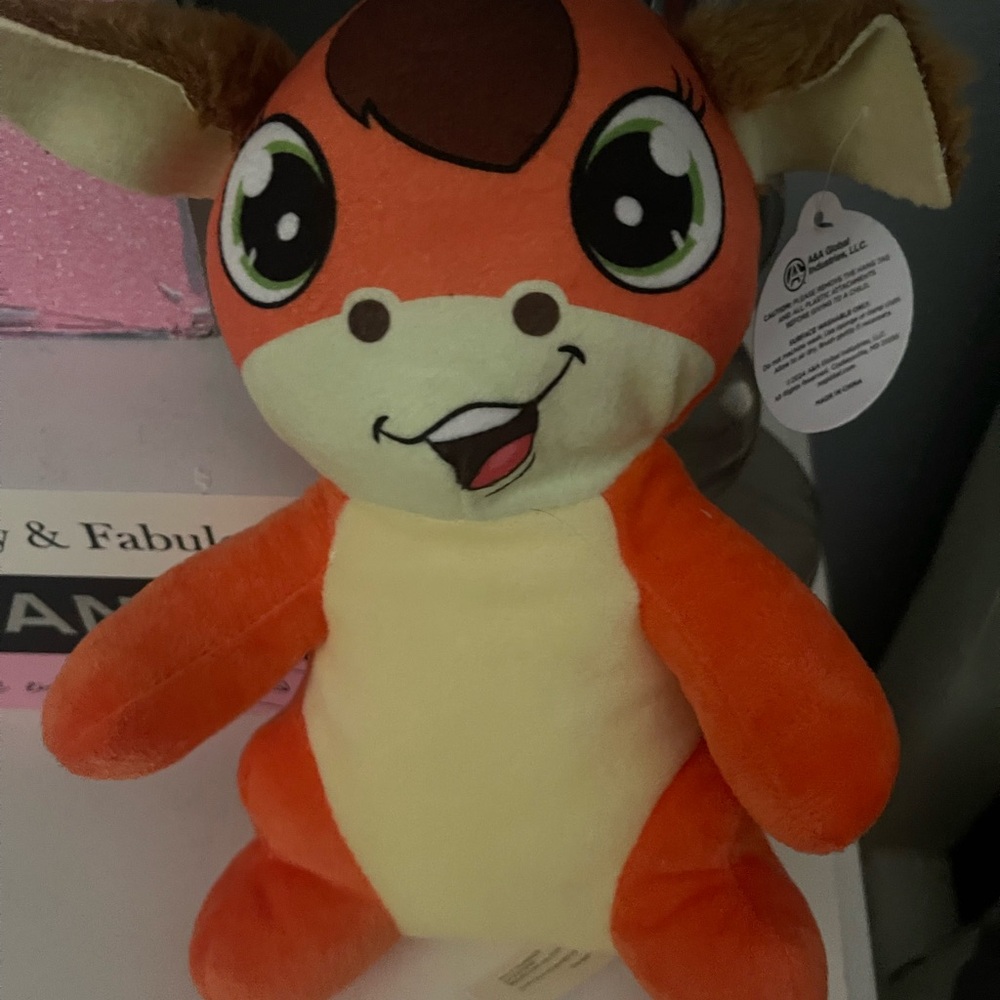 Orange and Cream Plush Toy